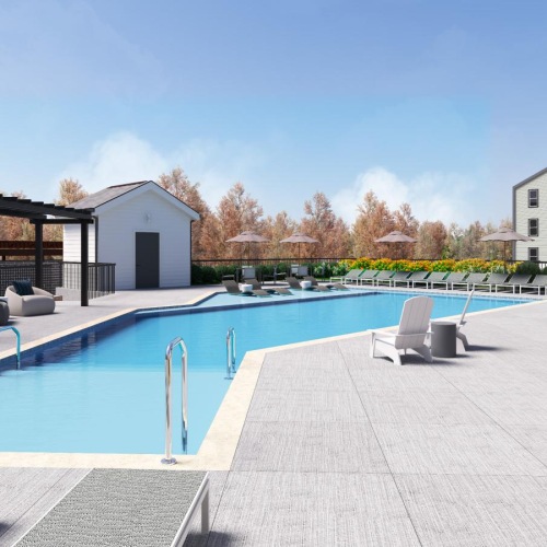 a swimming pool with a building in the background