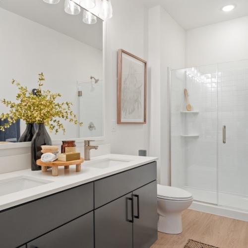 Spacious bathrooms with everything you need Bathroom with tile and glass shower