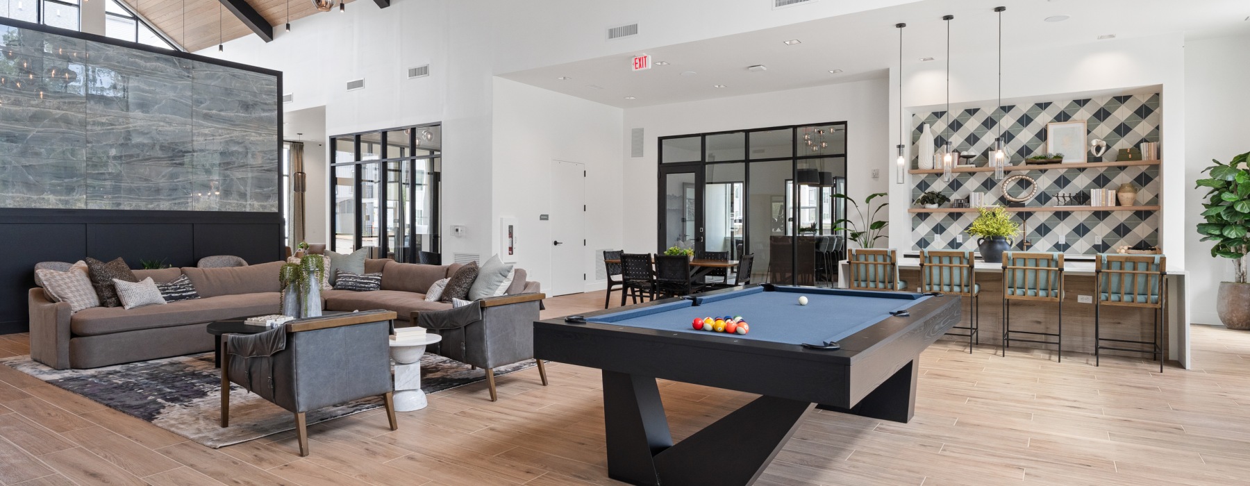 Clubhouse with space for entertaining, lounge seating and a pool table