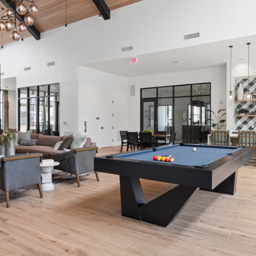 The essence of exceptional living Clubhouse with space for entertaining, lounge seating and a pool table
