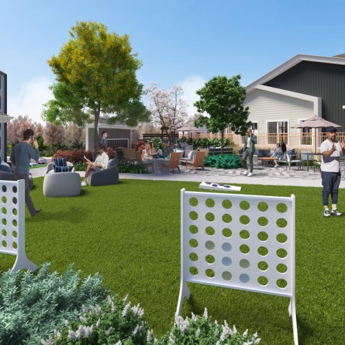 a group of people in a yard being active